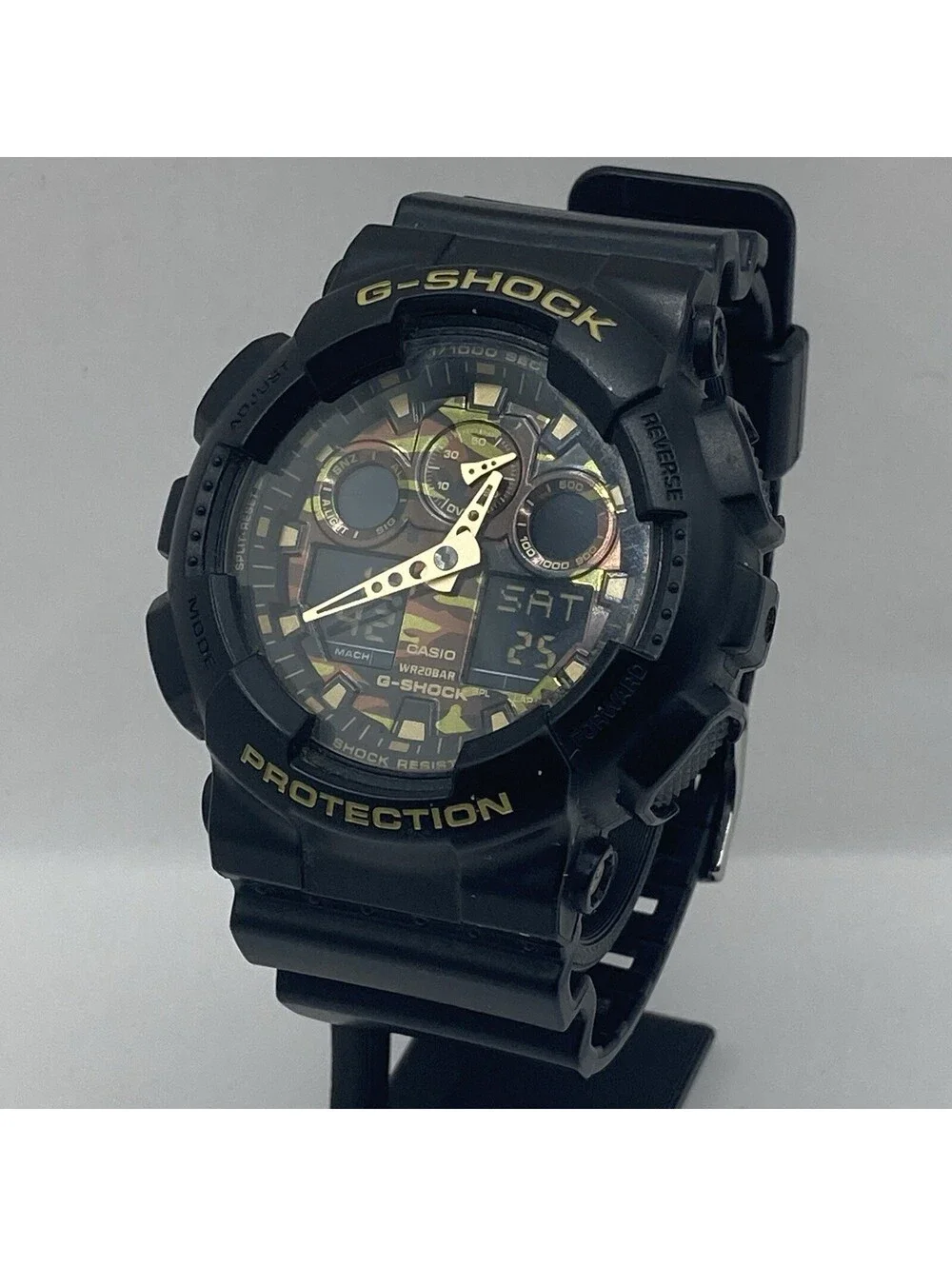 Casio G-Shock GA-100CF Green Camo Dial Digital Analog Men’s Watch Black 5081